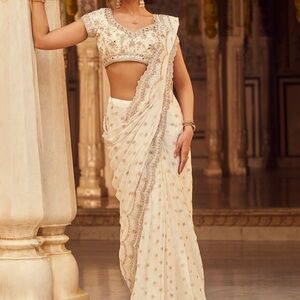 Elegant Cream Saree with Embellished Blouse